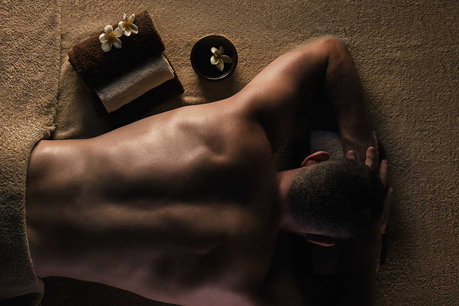 man laying face down for massage