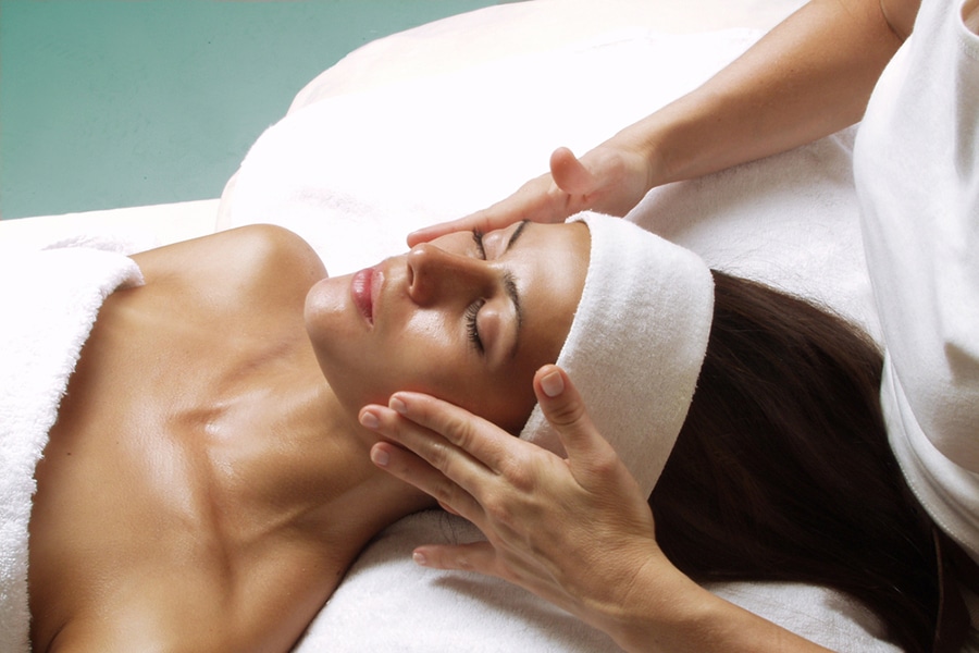 woman getting facial treatment