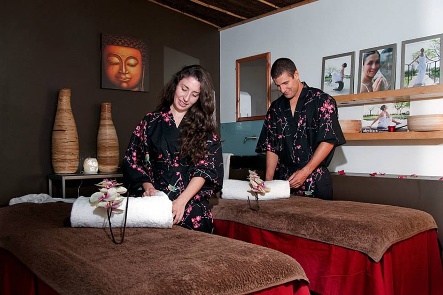 man and woman in japanese robe massage room