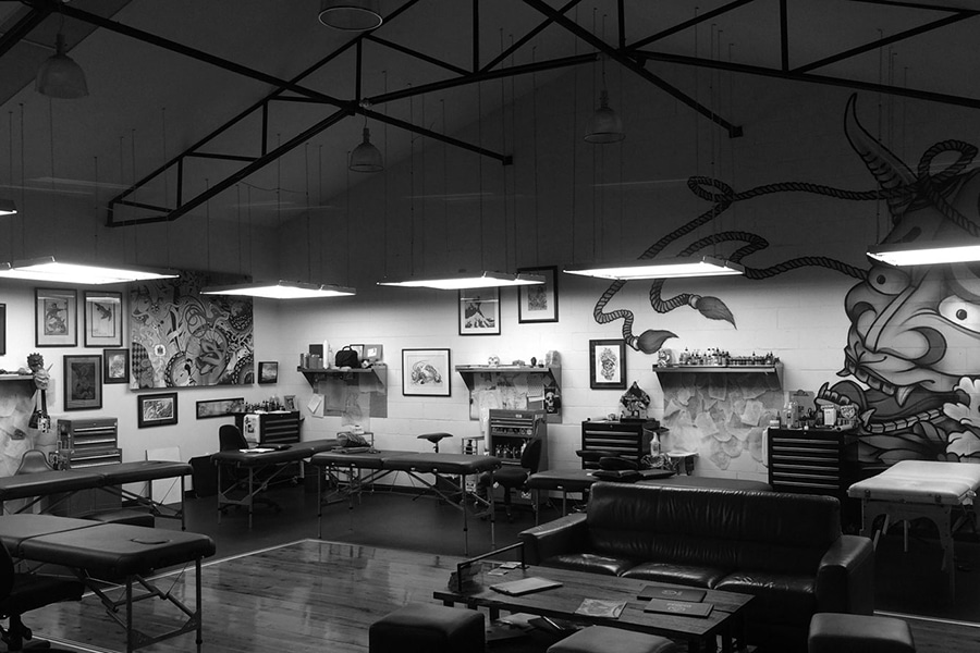 black and white light house tattoo studio