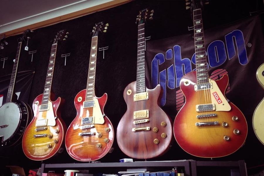  guitars plus on the wall