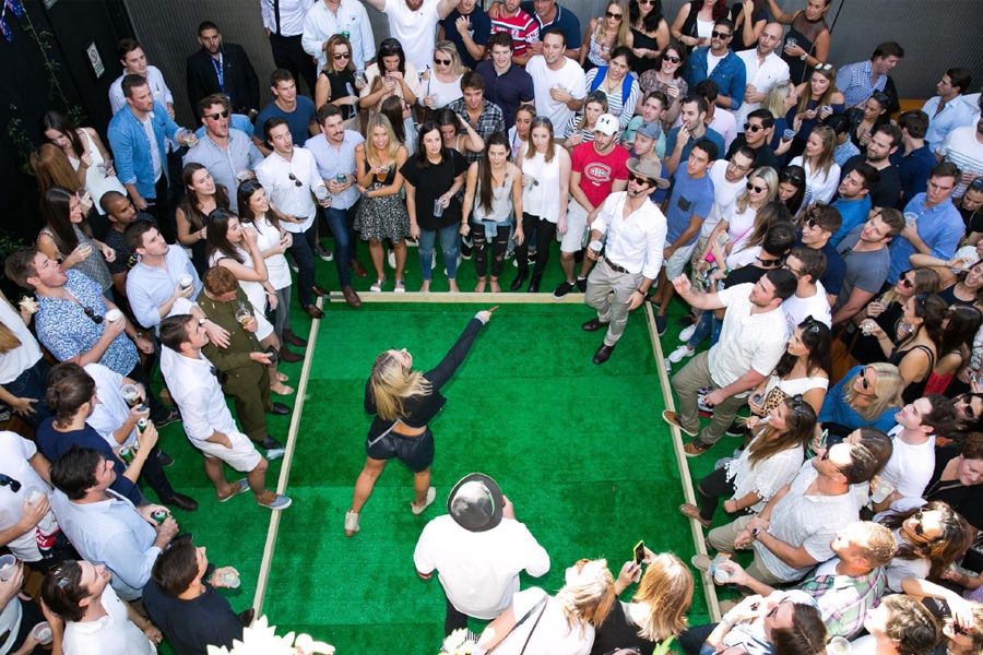 woollahra hotel girl pointing in indoor grass field