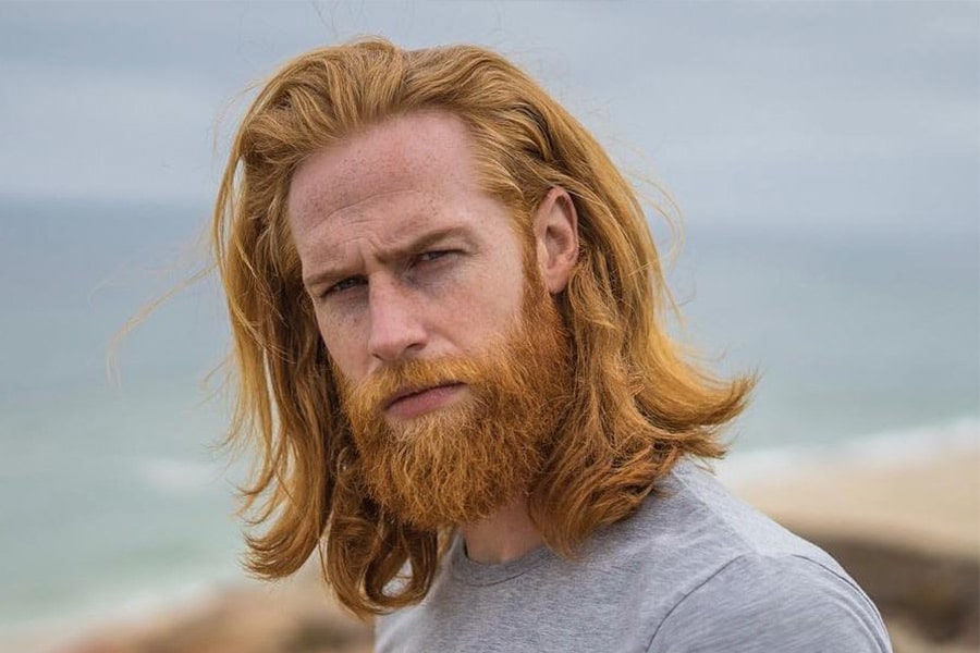 ginger layered medium haircut with full beard