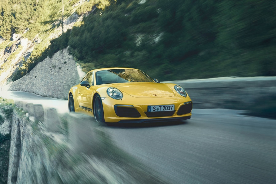 porsche 911 carrera t running on the road