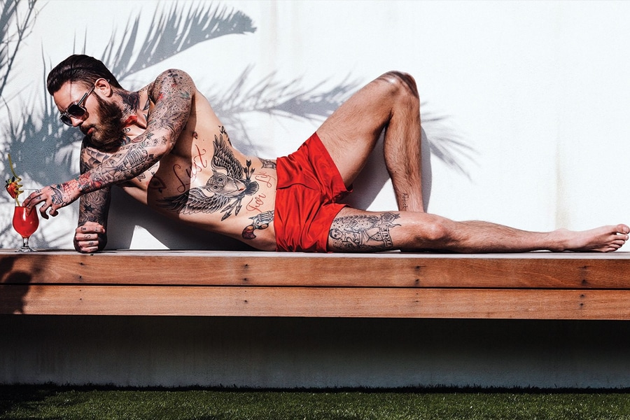 Billy Huxley Male model in red shorts 