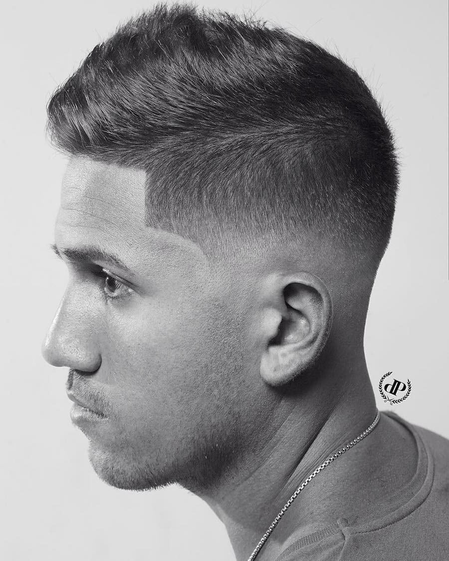 short back and sides haircut with longer fringe on top on man