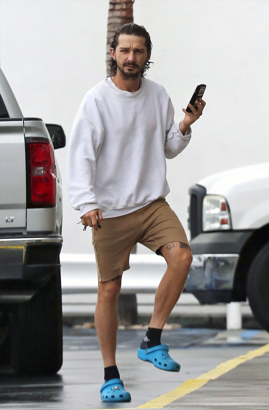 Shia Lebeouf in blue crocs