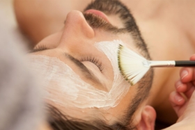 Man having facial treatment