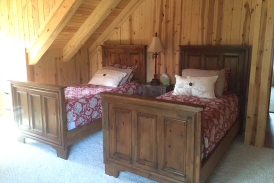 tony starks cabin bedroom in the attic