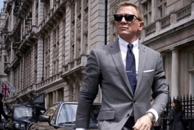Daniel Craig in a gray suit
