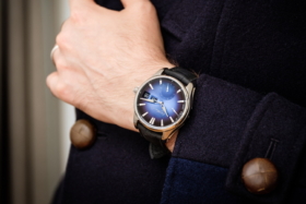 An H. Moser & Cie watch on a wrist