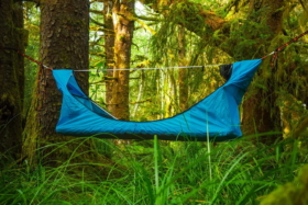 A blue Haven Hammock tent