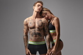 Justin Bieber and a female model in Calvin Klein underwear