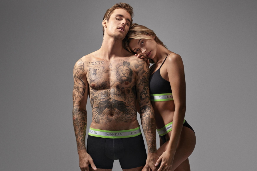 Justin Bieber and a female model in Calvin Klein underwear