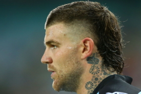 Profile of a man with a mullet
