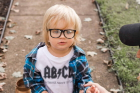 A baby with glasses