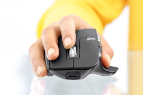 A hand holding Logitech MX Master 3 Mouse