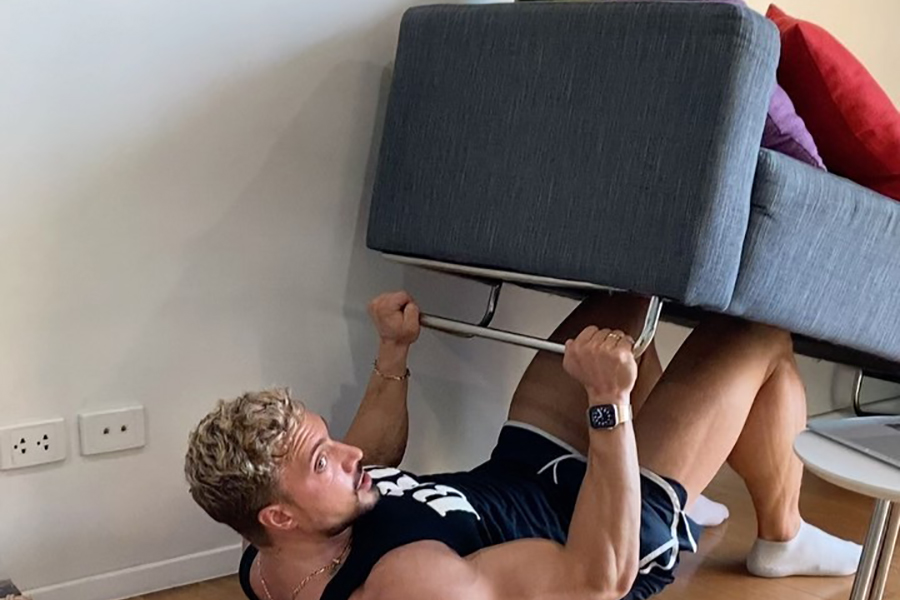 7 Exercises You Can Do With A Couch, According To A Bodybuilder