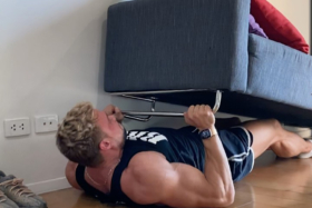7 Exercises You Can Do With A Couch, According To A Bodybuilder