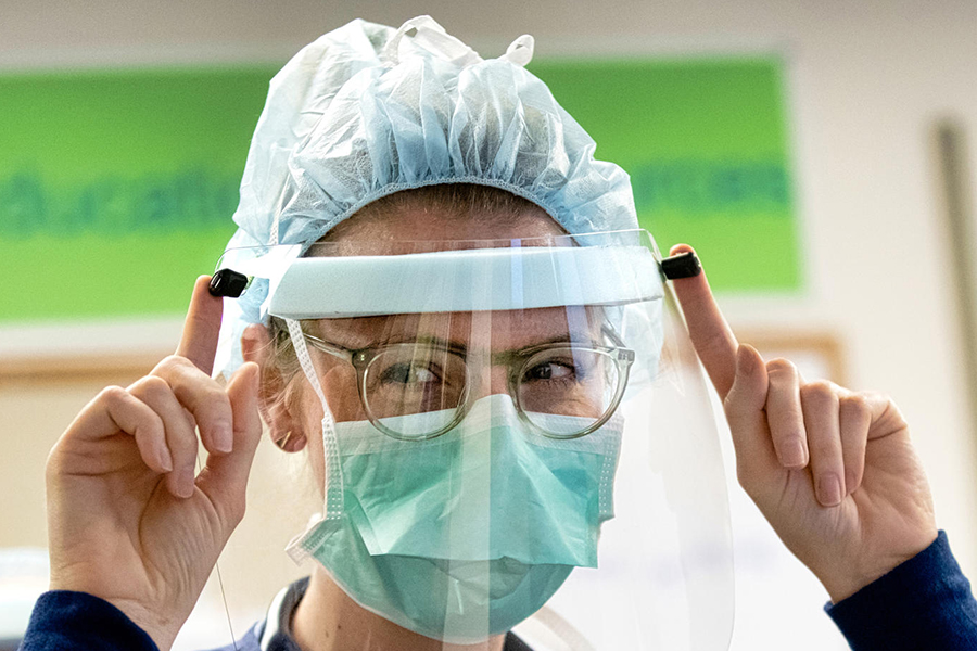 nurse wearing Nike Personal Protective Equipment