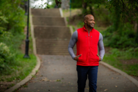 A model in a red SCOTTeVEST