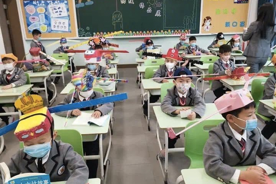 Feel-Good Friday - Chinese Kids' Social Distancing Hats