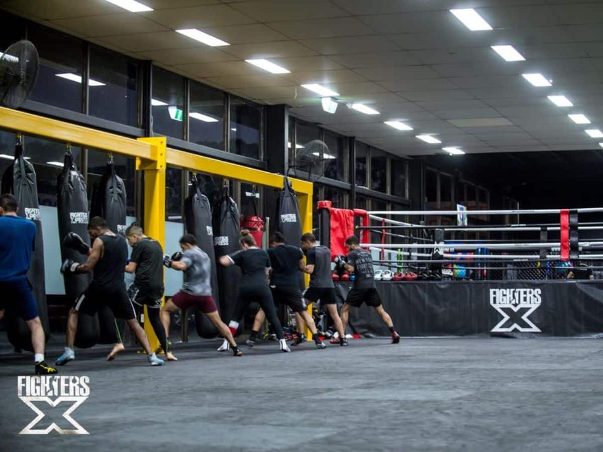 People punching punching bags at Fighters Xpress Dandenong