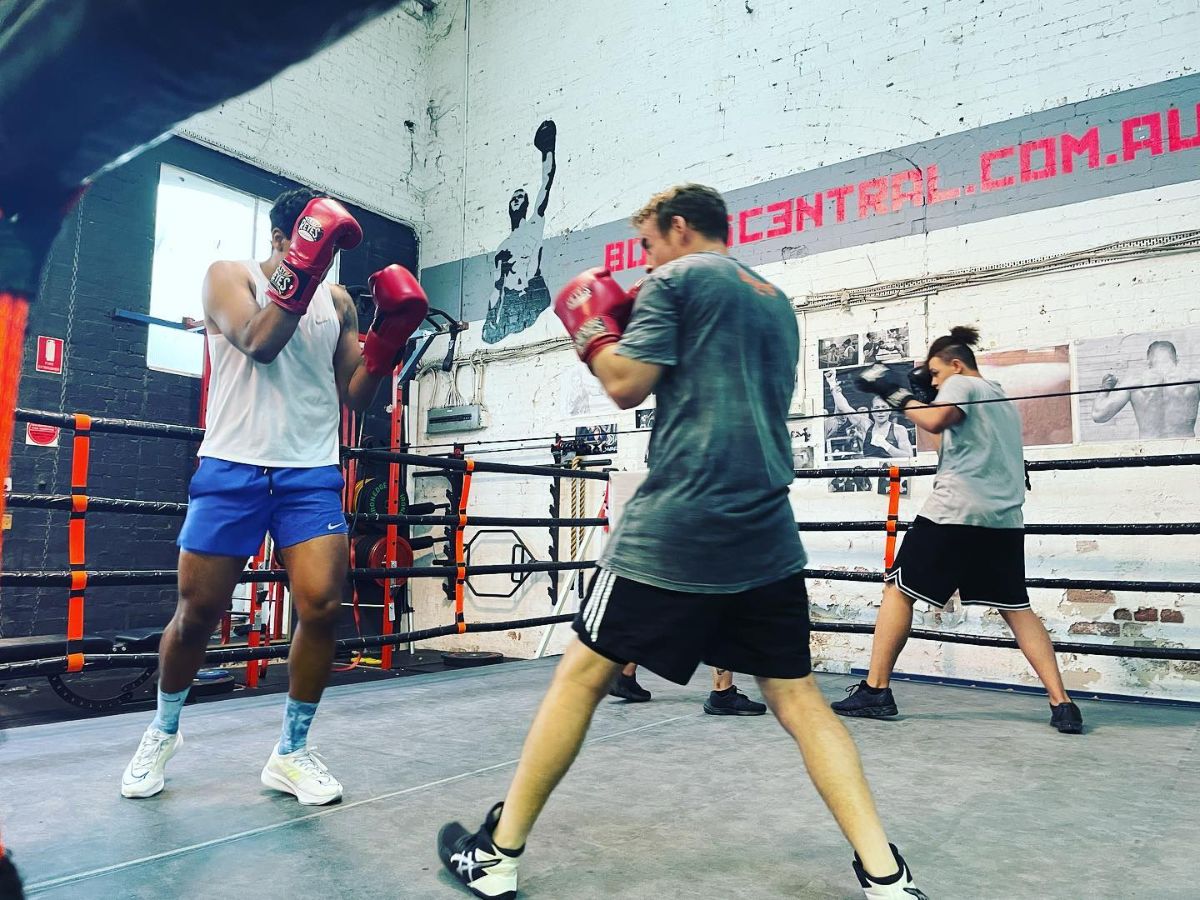 People inside ring practicing at Mischa’s Boxing Central Footscray