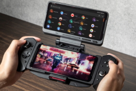 A pair of hands holding ASUS ROG 3 Gaming Phone