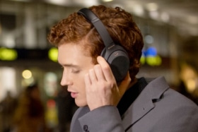 Profile of a an with Sony headphones on