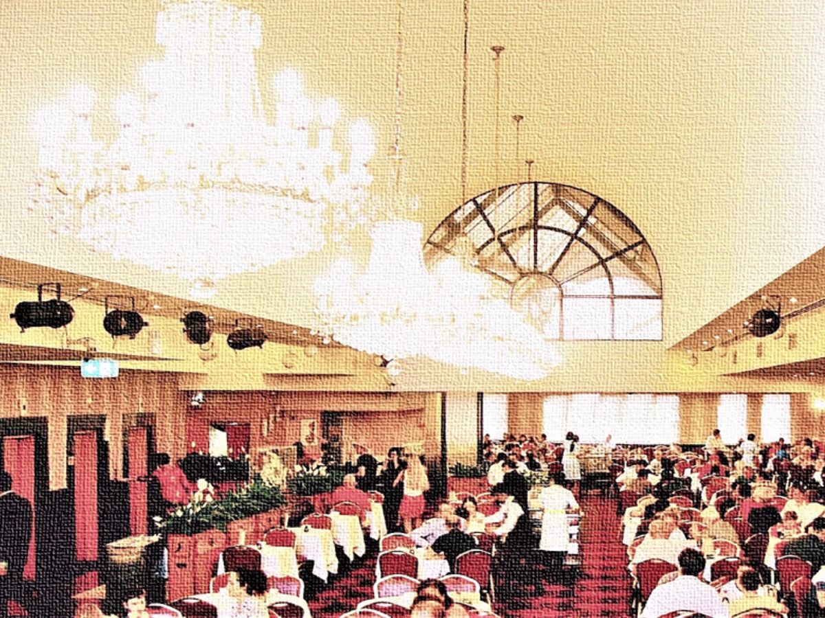 People at tables inside Marigold Restaurant