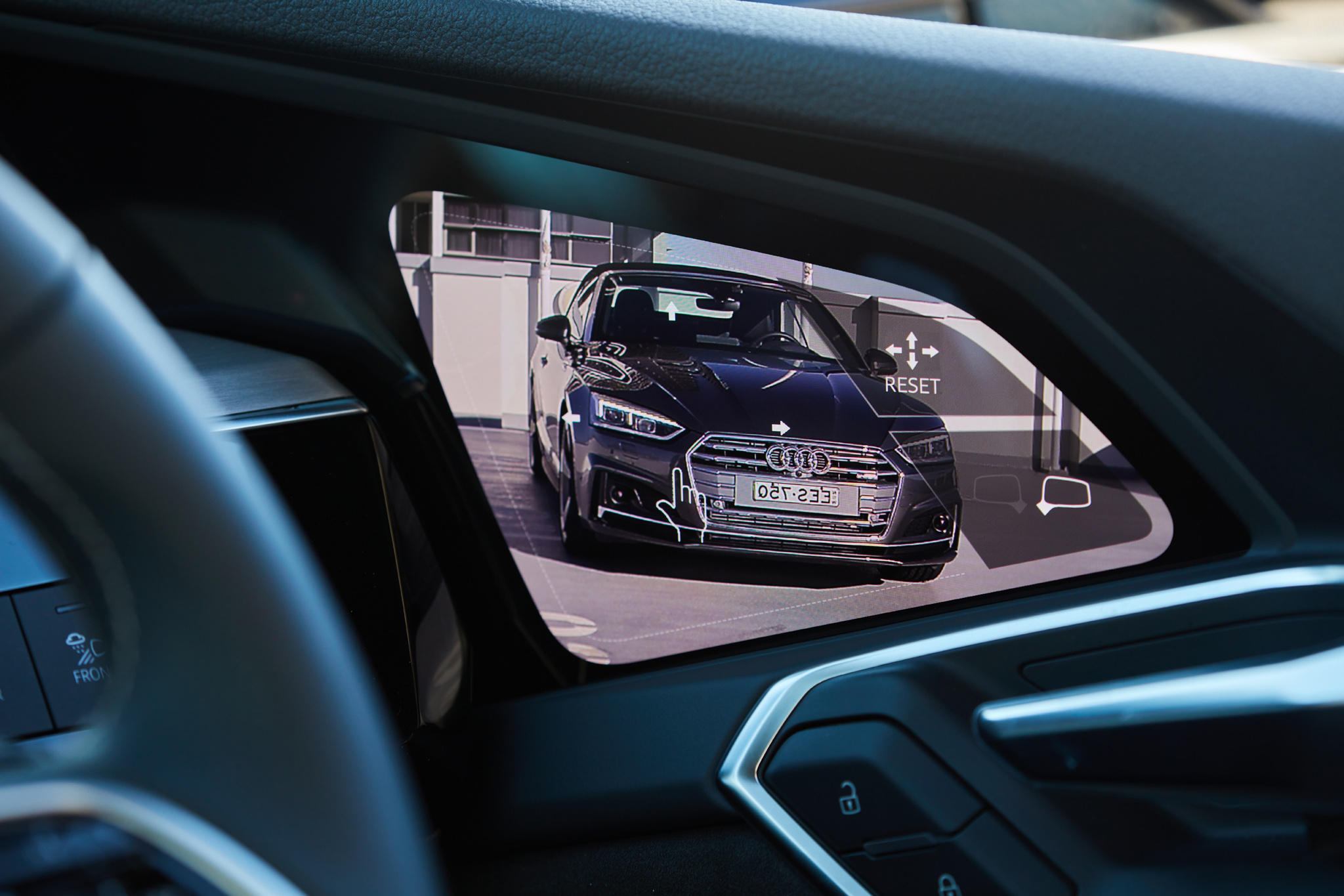 Audi e-tron SUV displayed on a cars virtual cockpit screen, highlighting the advanced electric vehicle technology.