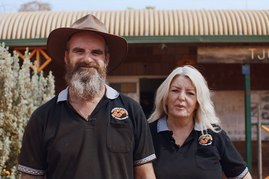 Ross and Carol in front of Tjukayirla Roadhouse