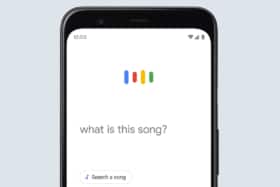 Phone screen showing Google app with text ‘what is this song?’