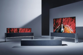 Two LG Rollable OLED TV RXs in a room with one rolled into stand