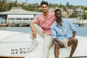 Two models in UNIQLO Linen shirts and pants/shorts