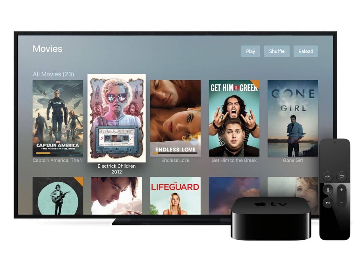 Plex app open on a TV with an Apple TV box and remote in front of screen