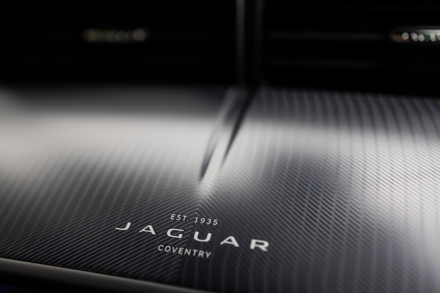 Interior of the 2021 Jaguar F-type showing the Jaguar title and established date on a leather seat