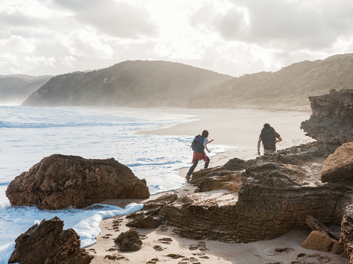 people walking on johanna beach great otway national park