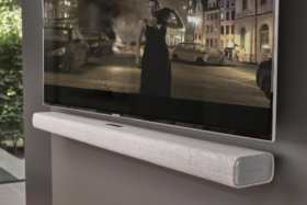 Harman Kardon Multibeam 700 mounted under a TV on wall