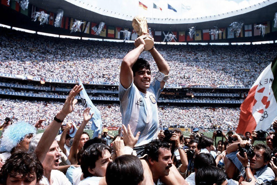 Maradona being carried on shoulder with FIFA trophy