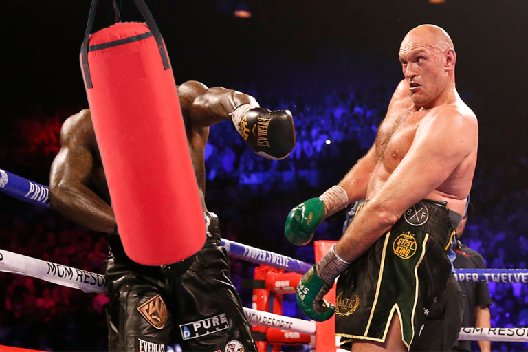 Watch Tyson Fury Literally Punch the Lights Out in Insane Workout Video ...