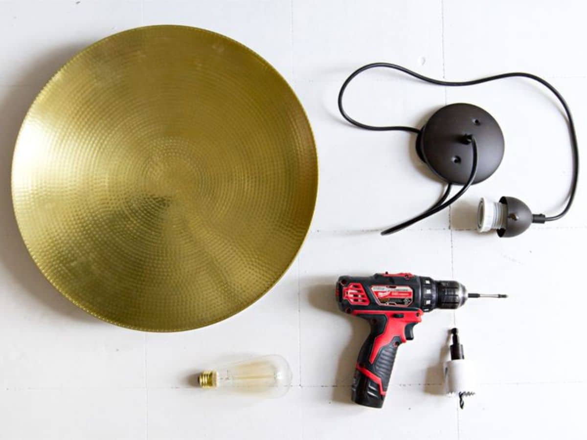 Lamp parts, a golden dish and a drill