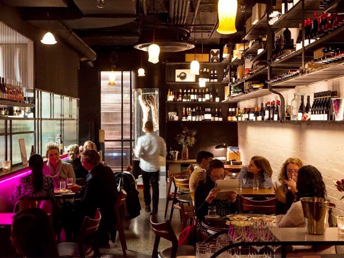 Interior of Juliet Melbourne restaurant with customers dining