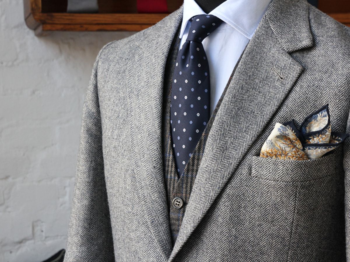 A grey suit with Puff Pocket Square