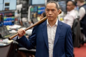 Ken Leung with a baseball bat from HBO's Industry