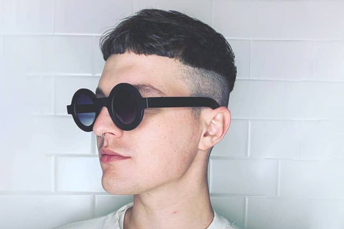 men's bowl cut with a mid fade hairstyle