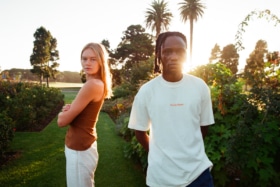A male and a female model wearing clothes from Flynn's Back to Basic collection