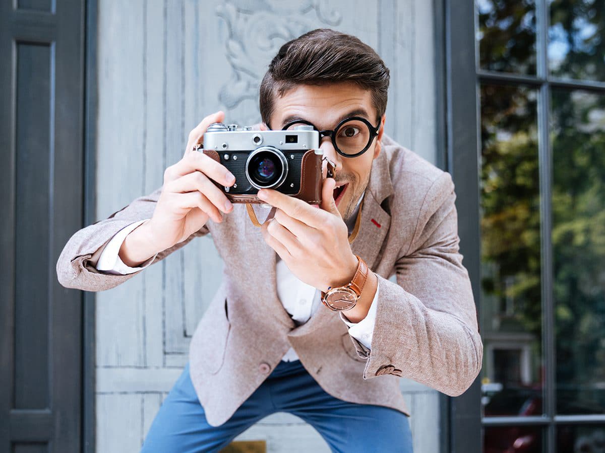 Man with Vintage Film Camera