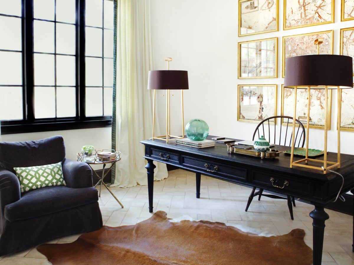 Black wood table and black armchair sofa in a home office